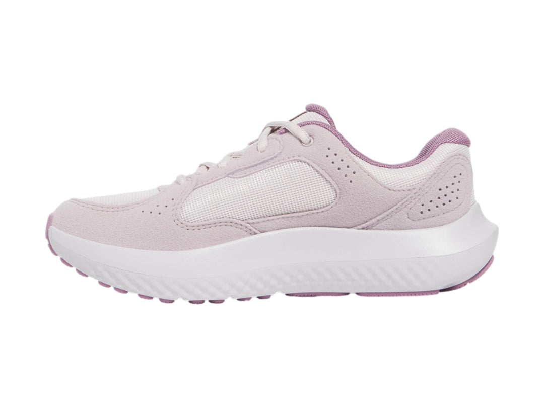 Tenis deportivos Under Armour Charged Versurge en color gris con suela blanca.