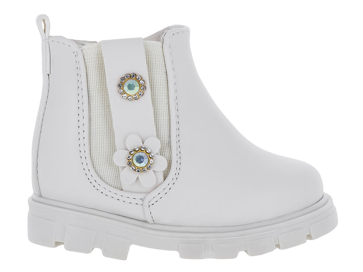Bota color latte para niña con suela track y adornos de flor y pedrería.