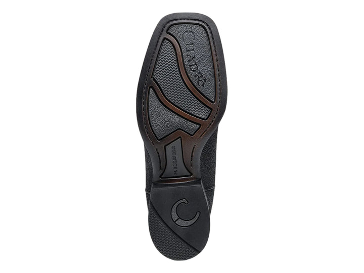 Bota vaquera color negro con acabado de piel de mantarraya en la punta y el pie.