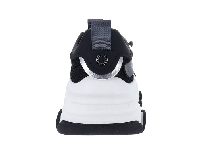 Tenis deportivos Steve Madden color negro y blanco con detalles plateados y suela chunky.