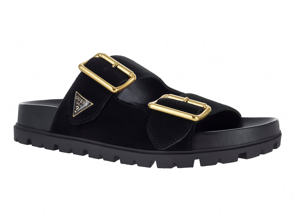 Sandalia negra GUESS con plataforma, suela dentada y dos hebillas decorativas en color dorado.