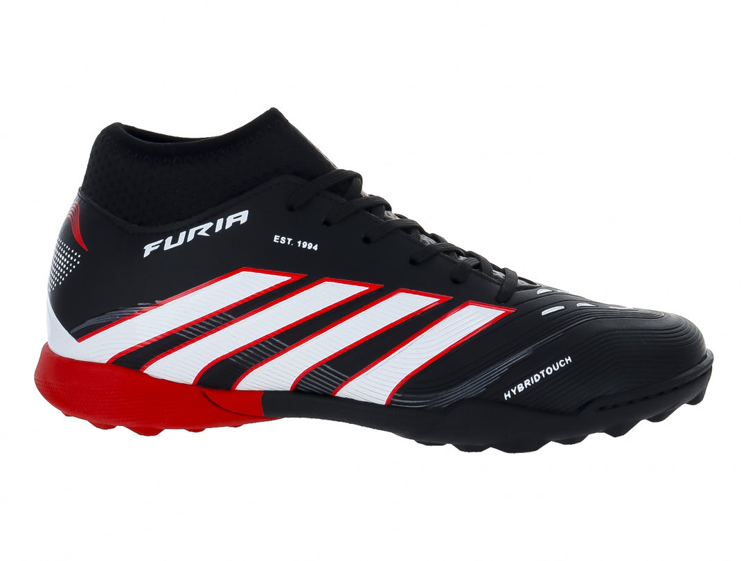 Zapato de fútbol Furia color negro con rayas blancas y suela roja para terreno sintético.