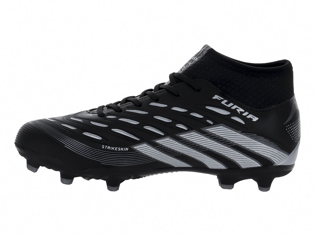 Calzado de fútbol marca FURIA en color negro con tres franjas plateadas laterales y cuello elástico.
