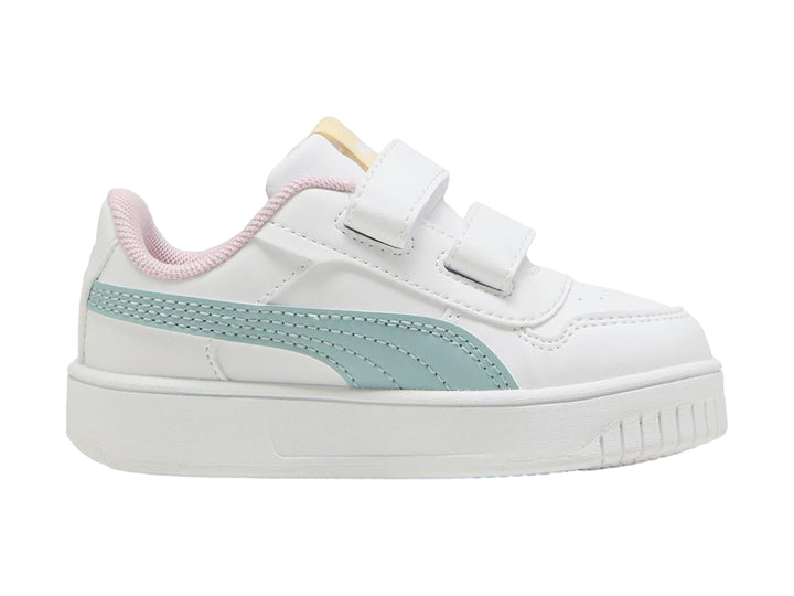 Tenis Puma blancos para niña con franja color menta, detalles en rosa y cierre de velcro.