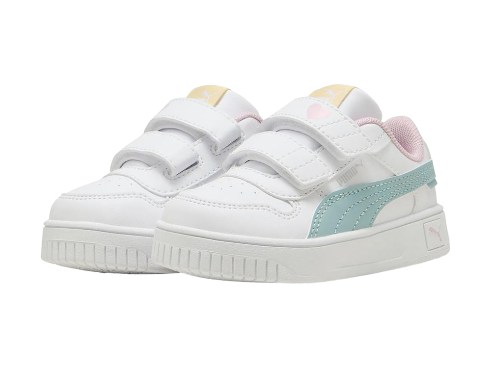 Tenis Puma blancos para niña con franja color menta, detalles en rosa y cierre de velcro.