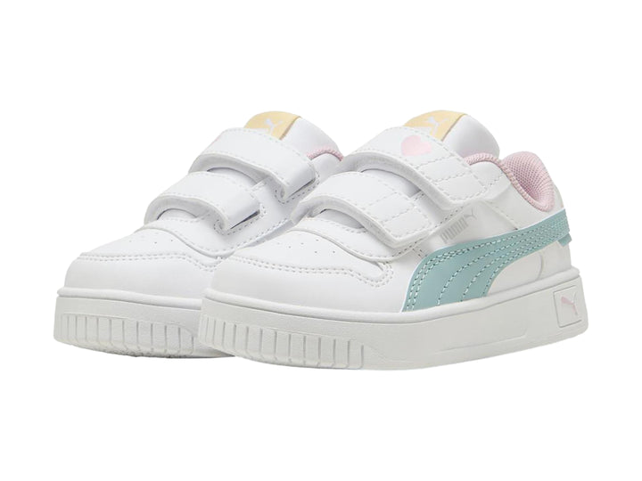 Tenis Puma blancos para niña con franja color menta, detalles en rosa y cierre de velcro.