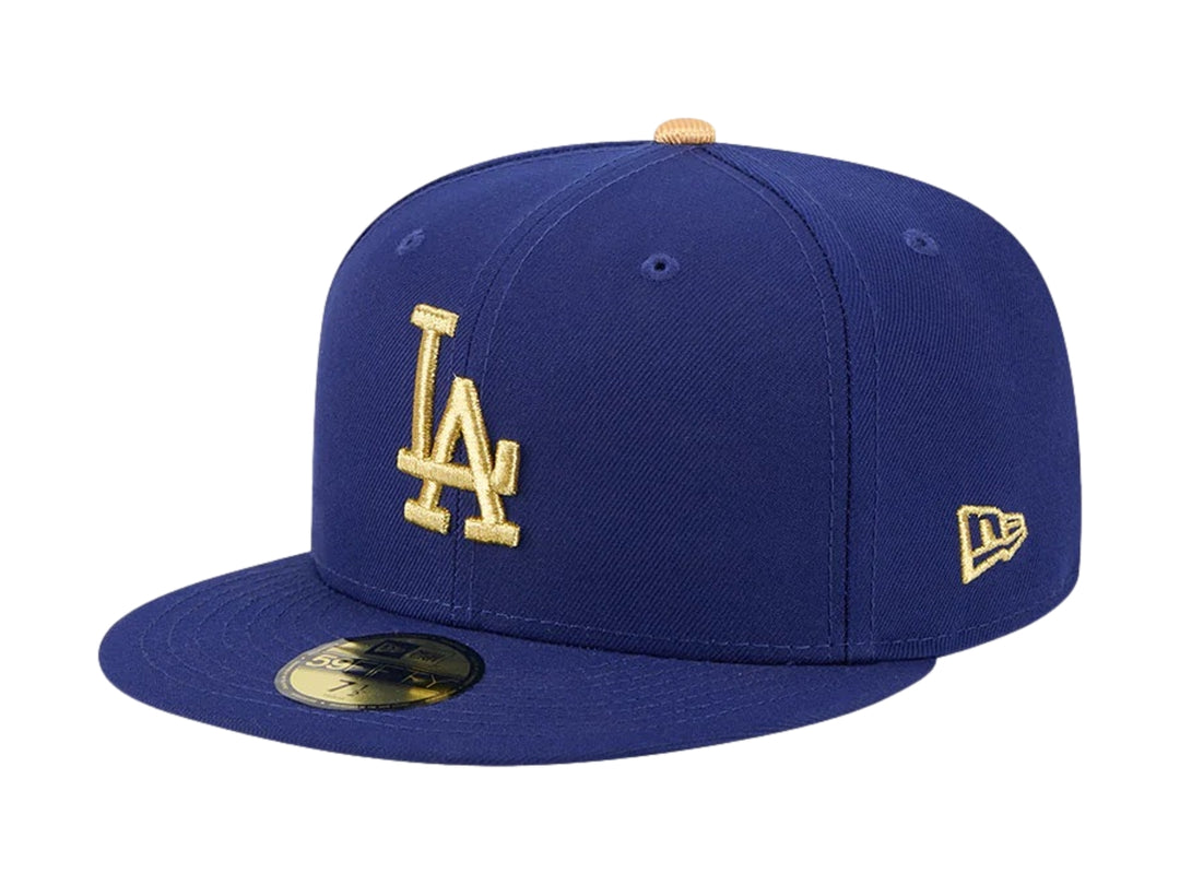 Gorra New Era de los Dodgers de Los Ángeles en color azul oscuro con logotipo bordado en dorado y visera plana.