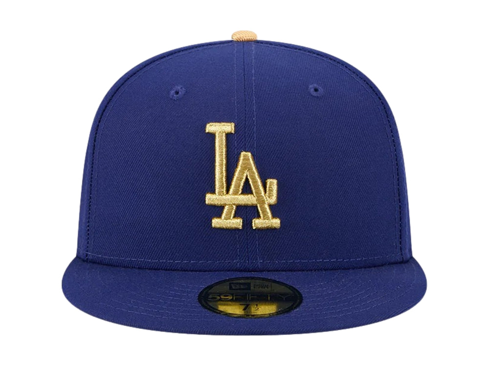 Gorra New Era de los Dodgers de Los Ángeles en color azul oscuro con logotipo bordado en dorado y visera plana.
