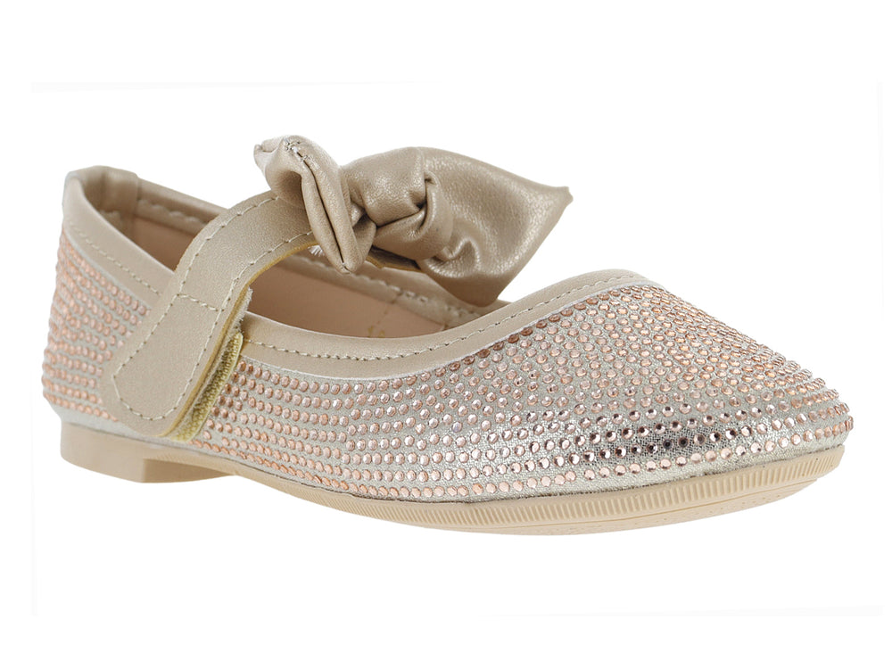 Zapato plano tipo bailarina color dorado con moño y acabado brillante texturizado.
