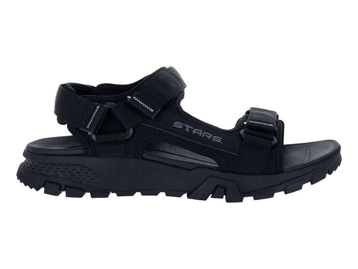 Sandalias gladiator STARS color negro con suela gruesa y correas ajustables.
