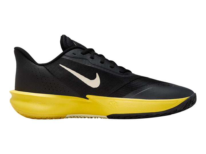 Tenis Nike Precision VII color negro con suela amarilla y logotipo blanco.