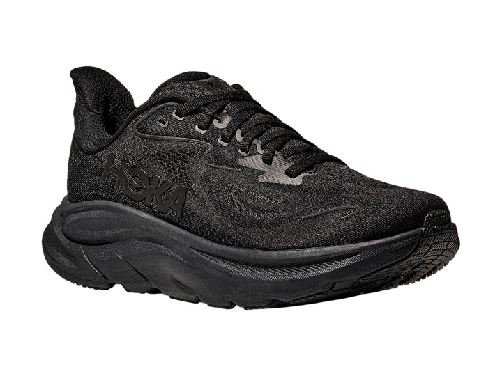 Tenis deportivos HOKA Clifton 10 en color negro total con suela ancha y malla transpirable.