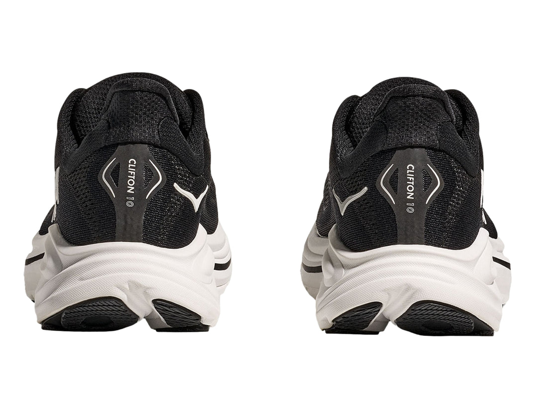 Tenis deportivos HOKA color negro con suela blanca ancha y logotipo blanco lateral.