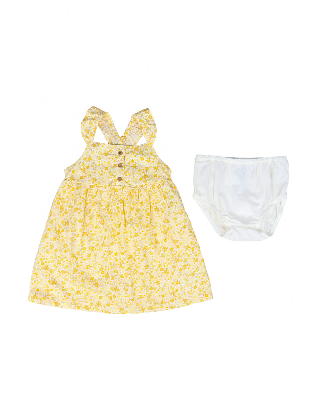 Conjunto de vestido amarillo con estampado floral y bombacho blanco para bebé.