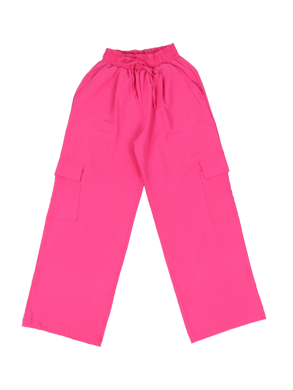 Niña vistiendo pantalón fucsia de pierna ancha con bolsillos laterales y cintura elástica sobre fondo blanco.