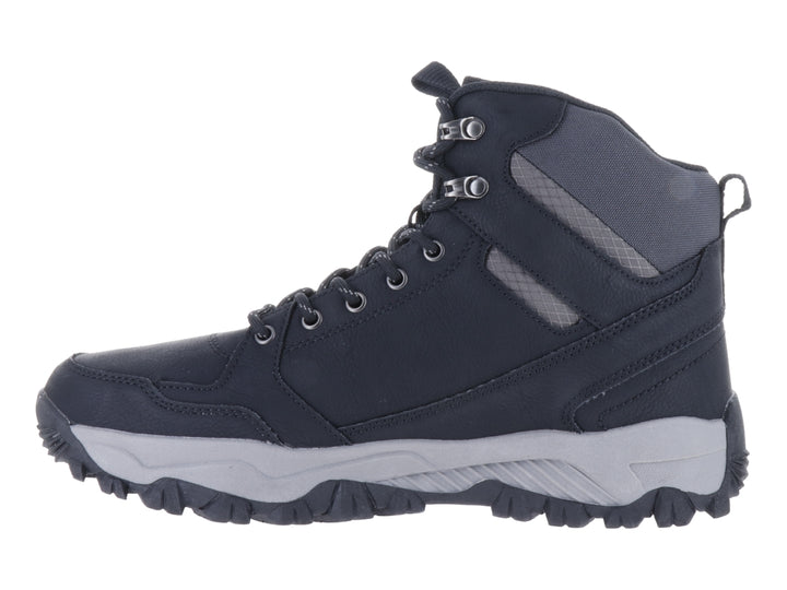 Botín deportivo Murren color negro con suela gris y diseño robusto para actividades al aire libre.