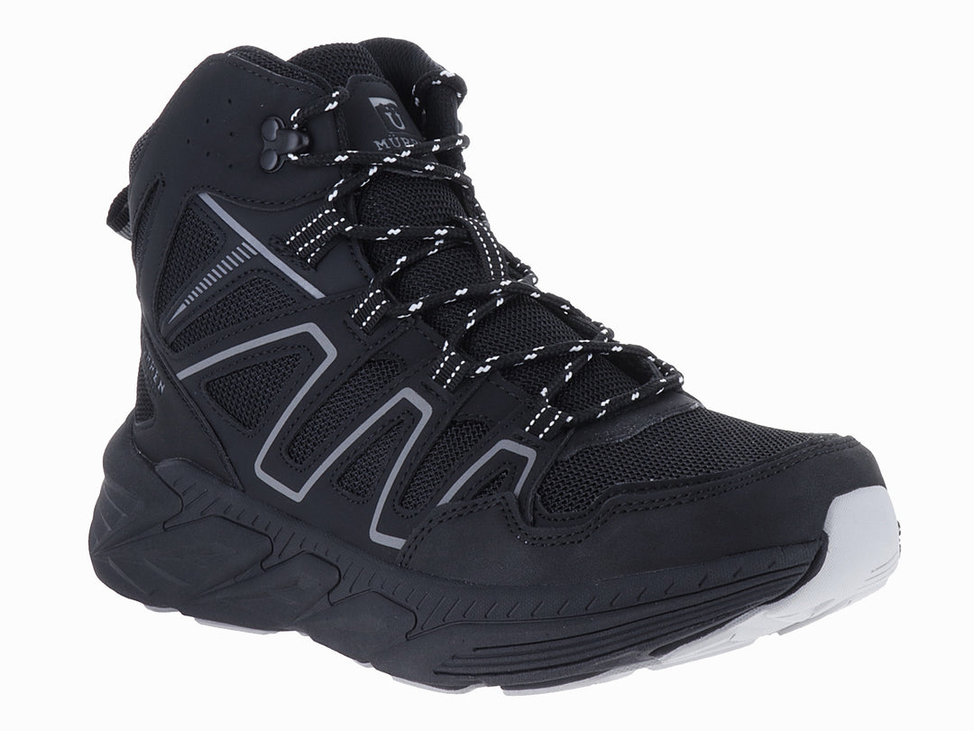 Zapato deportivo de corte medio color negro con detalles grises y suela gruesa de la marca Murren.