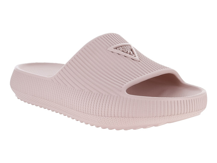 Sandalia slide color rosa con textura estriada y suela gruesa.