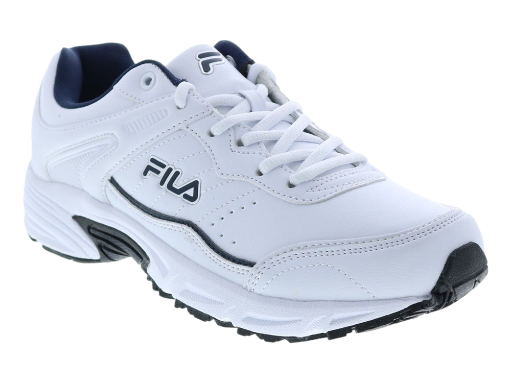 Tenis deportivos FILA de color blanco con detalles en azul marino y suela blanca.