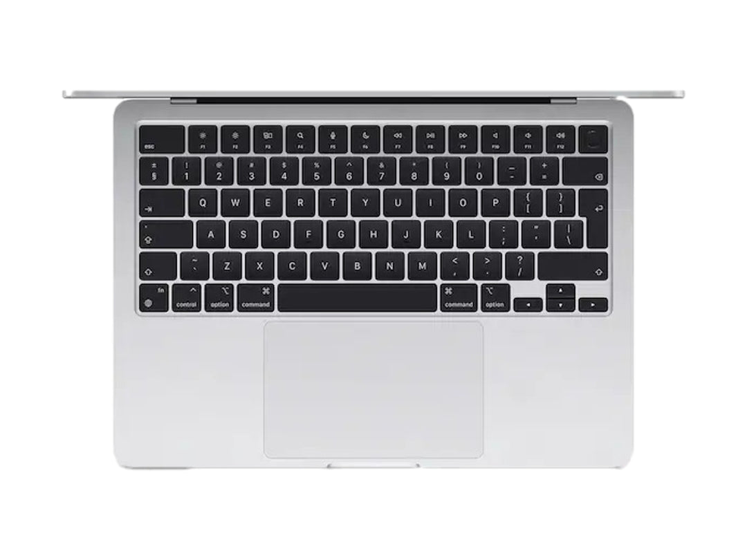 Laptop Apple MacBook Air color plata con pantalla encendida mostrando fondo abstracto en tonos azules y verdes.