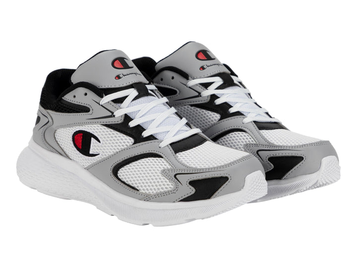 Tenis deportivos Champion modelo Brisk Retro Run en colores blanco, gris y negro con detalles en rojo.