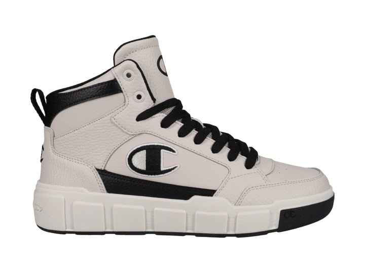 Tenis Champion de bota color beige con detalles y cordones en color negro.