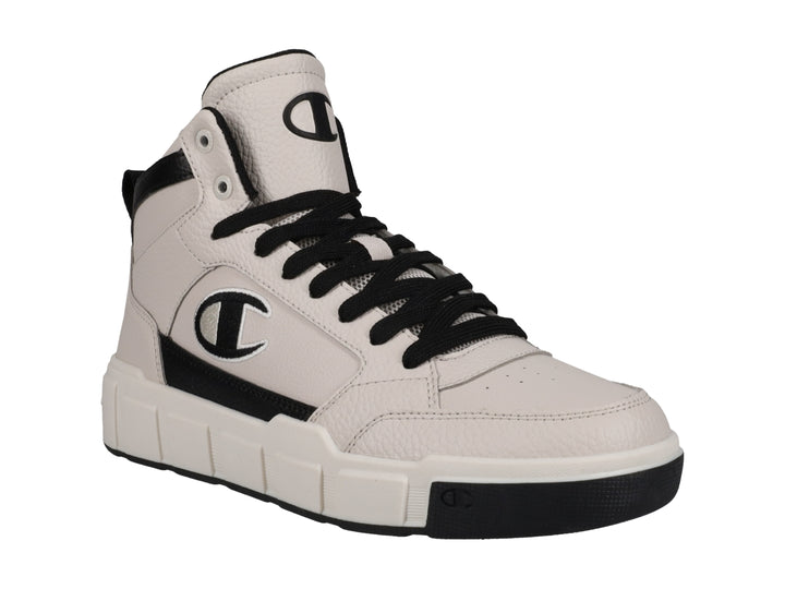 Tenis Champion de bota color beige con detalles y cordones en color negro.