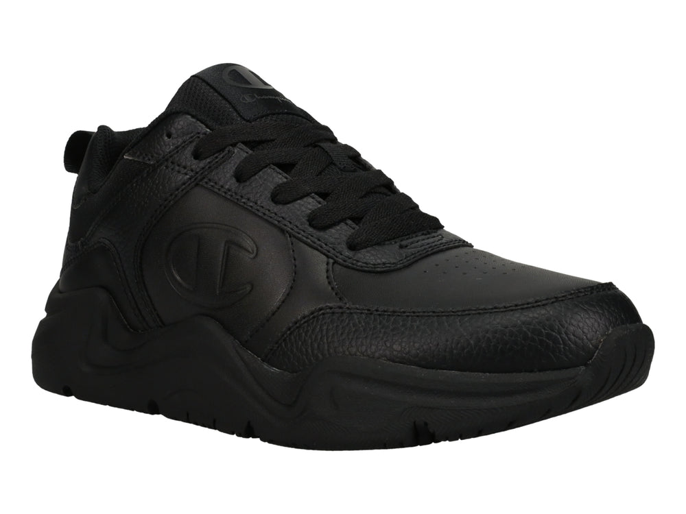 Tenis Champion color negro con suela gruesa y logotipo grabado en el lateral.