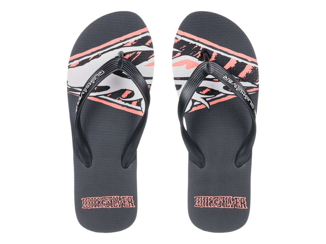 Sandalias Quiksilver color negro con detalle en rosa en la suela y correa negra.