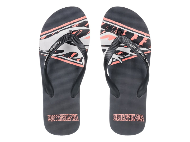 Sandalias Quiksilver color negro con detalle en rosa en la suela y correa negra.