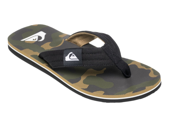Sandalia de dedo Quiksilver en colores negro y beige con suela blanca y negra.