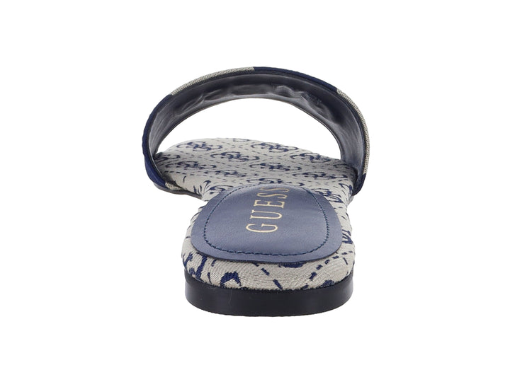 Sandalia deslizante GUESS en colores marfil y azul marino con logotipo en la correa.