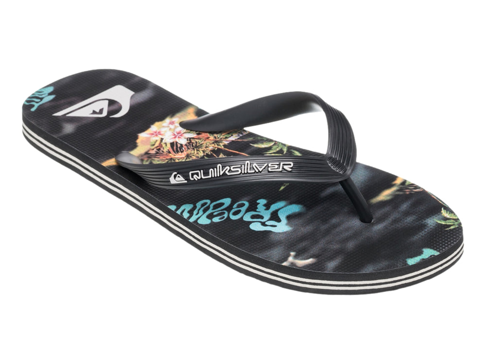 Sandalia Quiksilver negra con suela blanca y plantilla con diseño estampado.