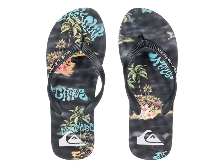 Sandalia Quiksilver negra con suela blanca y plantilla con diseño estampado.