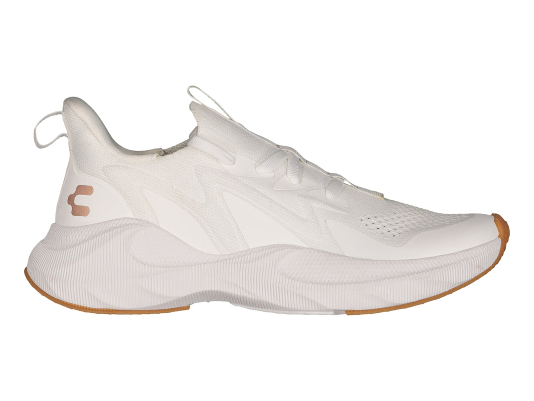 Tenis deportivos Charly color blanco con suela de goma y detalles en rosa.
