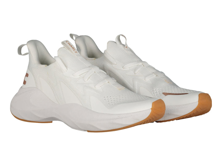 Tenis deportivos Charly color blanco con suela de goma y detalles en rosa.