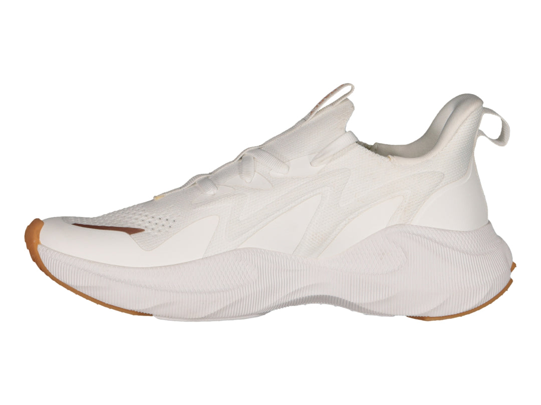 Tenis deportivos Charly color blanco con suela de goma y detalles en rosa.