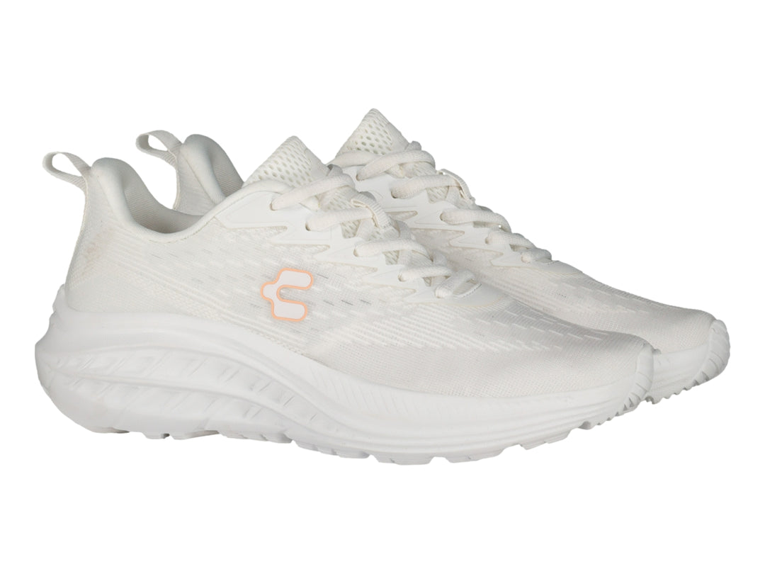 Tenis deportivos Charly color blanco con suela amortiguada y tejido transpirable.