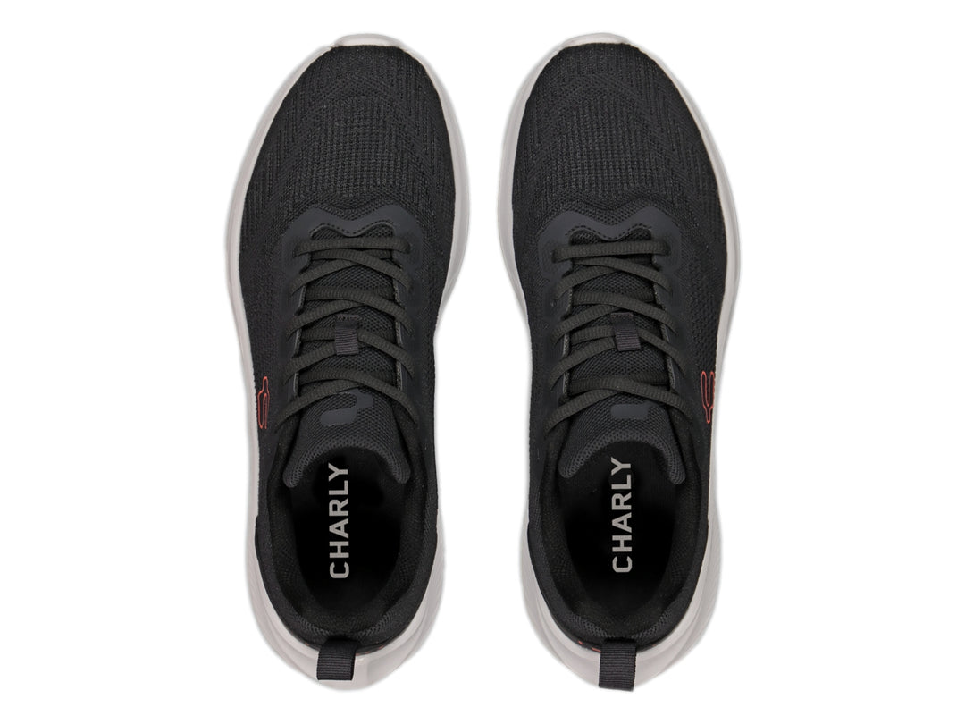 Tenis deportivos Charly color gris oxford con suela blanca y logotipo en contraste.