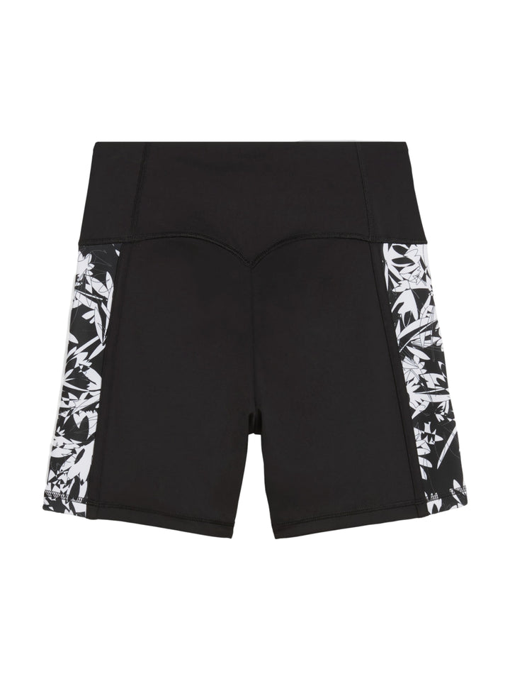 Shorts deportivos ajustados color negro con estampado blanco lateral y cintura alta de la marca Puma.