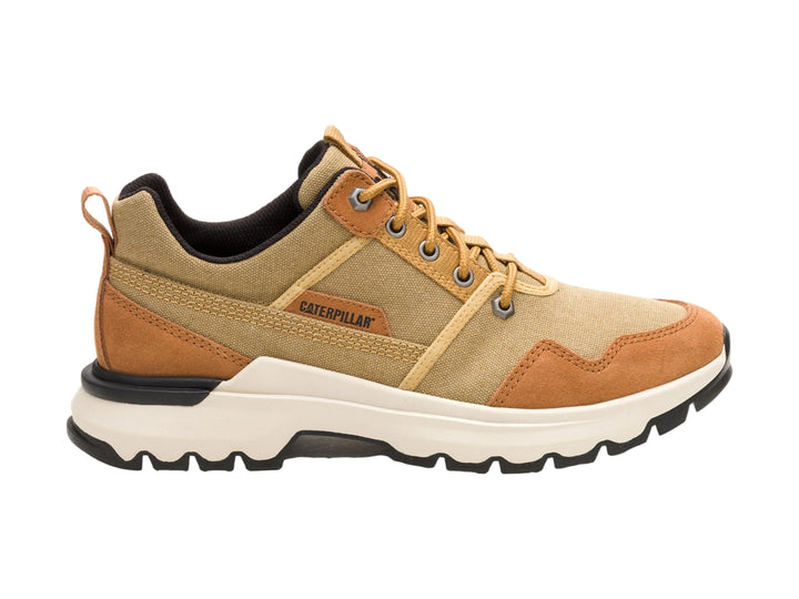 Tenis Caterpillar modelo Curry Colorado en color mostaza con suela blanca y detalles en negro.