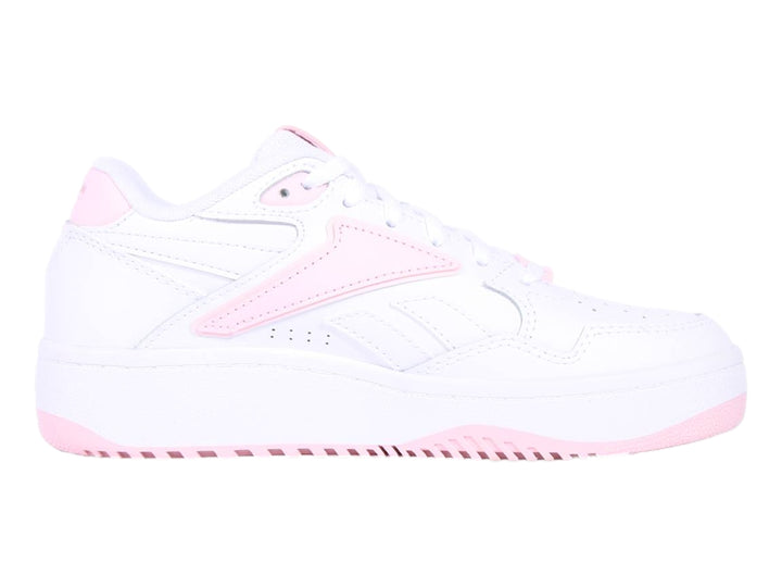Tenis Reebok blancos con detalles en color rosa, diseño deportivo para niños.