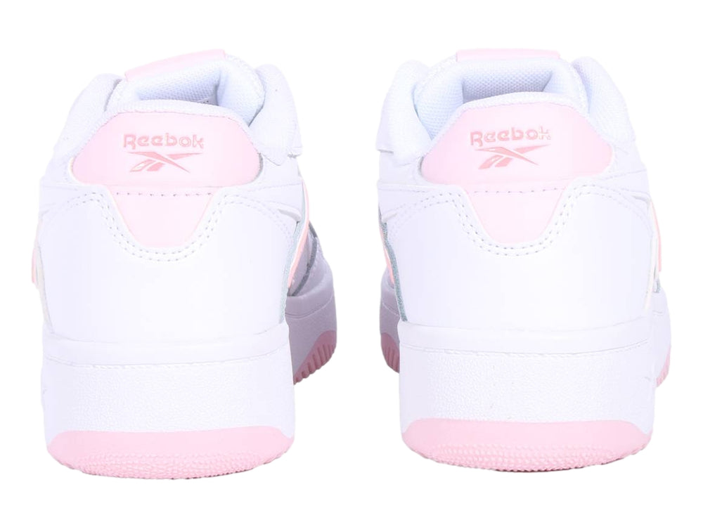 Tenis Reebok blancos con detalles en color rosa, diseño deportivo para niños.