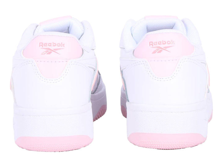 Tenis Reebok blancos con detalles en color rosa, diseño deportivo para niños.