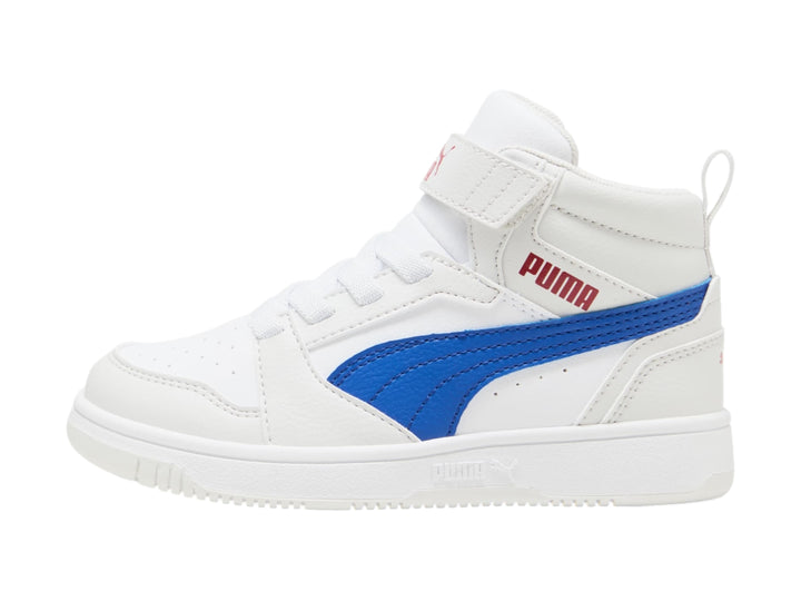 Tenis PUMA blancos de corte alto con franja azul lateral y suela blanca para niños.