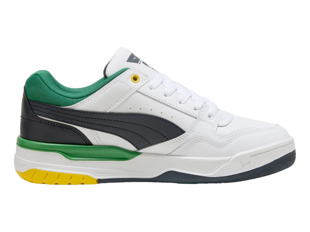 Tenis PUMA Rebound Retro blancos con acentos en verde, azul marino y amarillo.