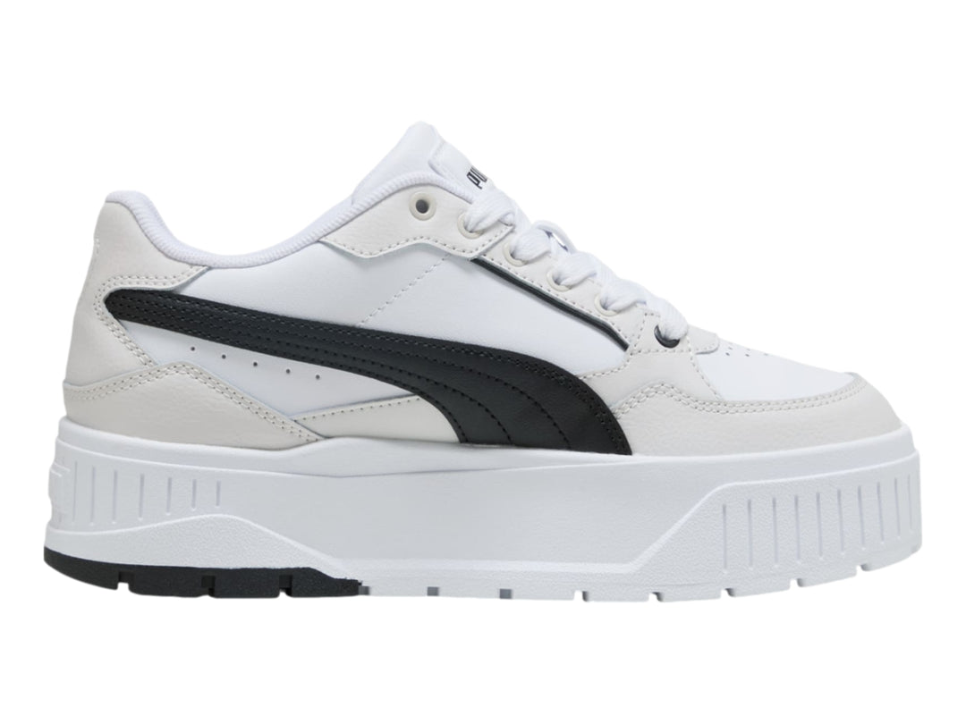 Tenis PUMA modelo Carmen II L en color blanco con detalles en negro y gris, con suela de plataforma elevada.