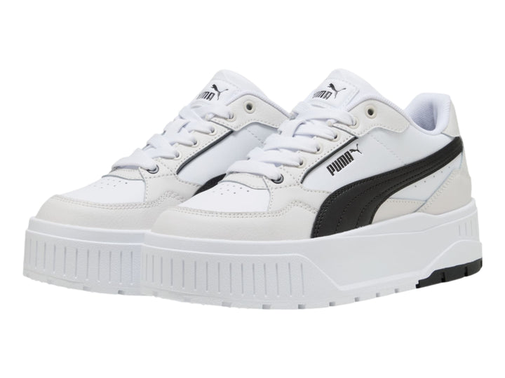 Tenis PUMA modelo Carmen II L en color blanco con detalles en negro y gris, con suela de plataforma elevada.