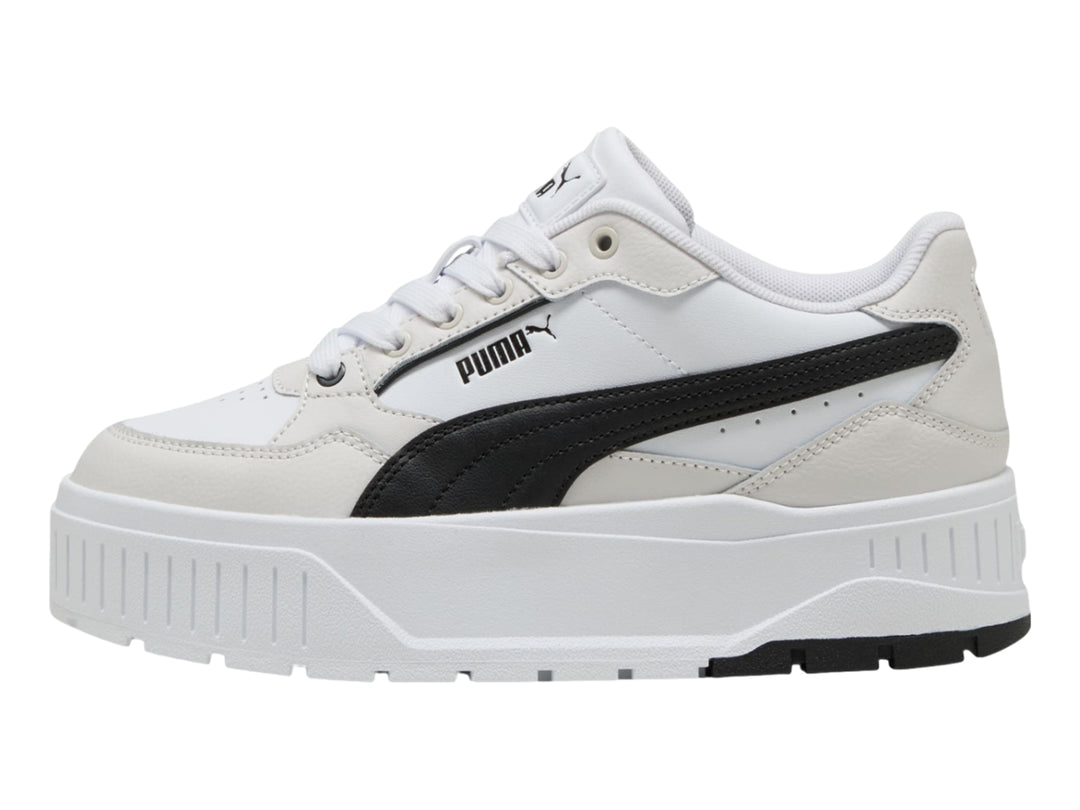Tenis PUMA modelo Carmen II L en color blanco con detalles en negro y gris, con suela de plataforma elevada.