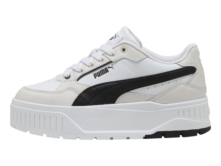 Tenis PUMA modelo Carmen II L en color blanco con detalles en negro y gris, con suela de plataforma elevada.